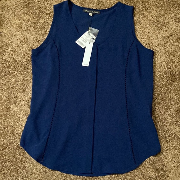 Rose & Olive Tops - ROSE & OLIVE NAVY BLUE BLOUSE. SIZE M. IT HAS A FLAP OVER THE BUTTONS. V-NECK